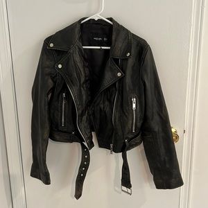 lightly worn leather jacket